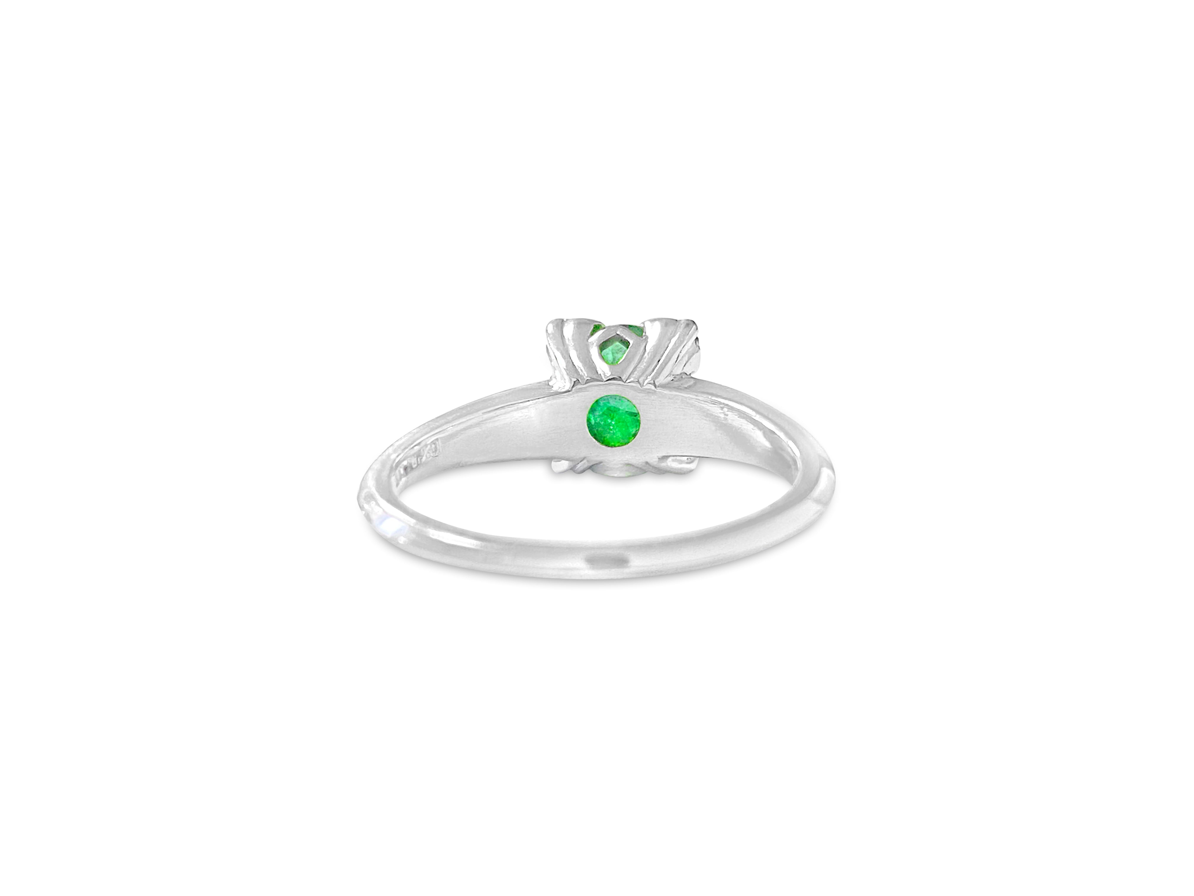 Vintage Platinum, 1.76 Carat Diamond & Emerald Ring.